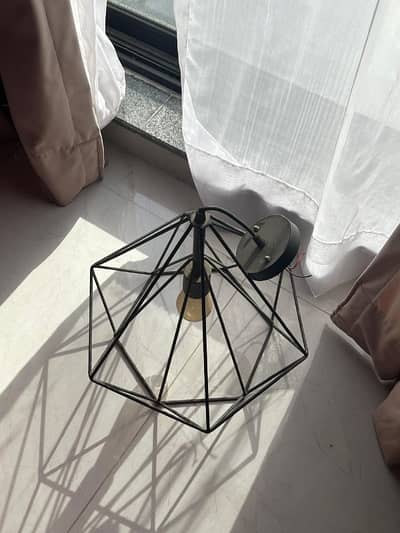 hanging pattern pair of lamps