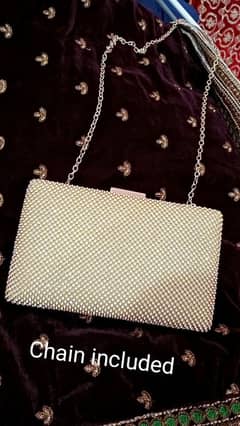 Golden clutch for sale