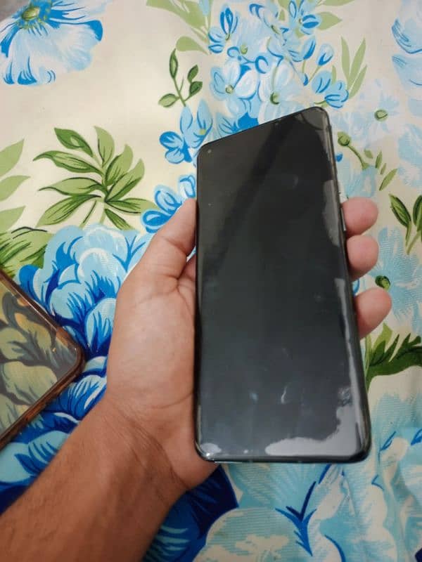 OnePlus 9 pro with charger and 02 back covers 0