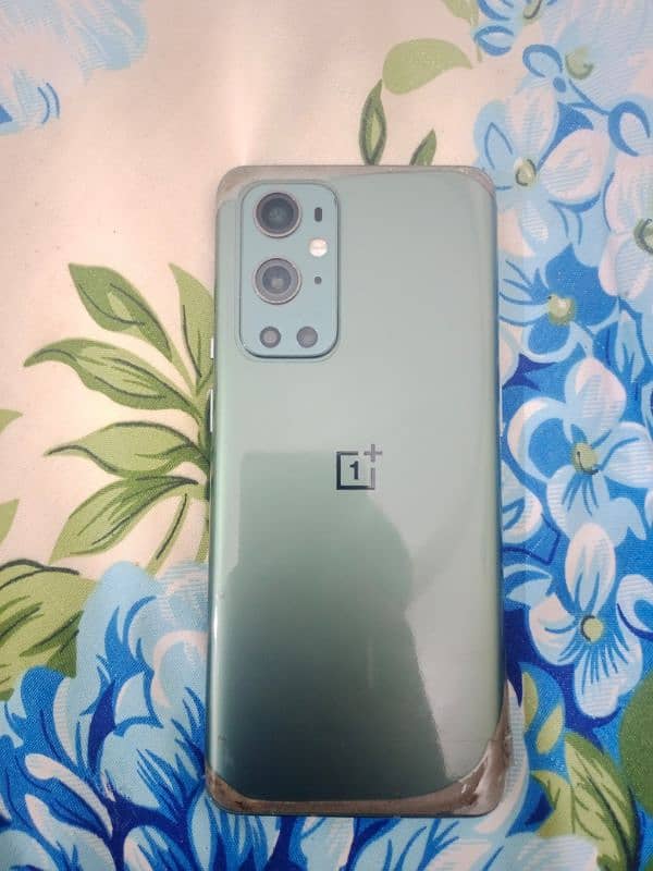 OnePlus 9 pro with charger and 02 back covers 3