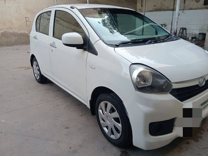 Daihatsu Mira L 1