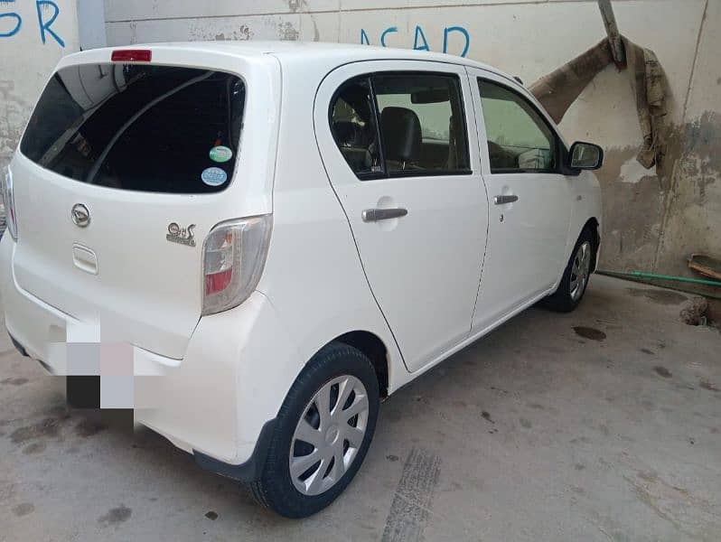 Daihatsu Mira L 7