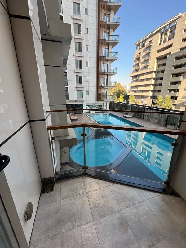 Modern Pool-Facing 1-Bed for Rent Live the Resort Lifestyle in Islamabad 1