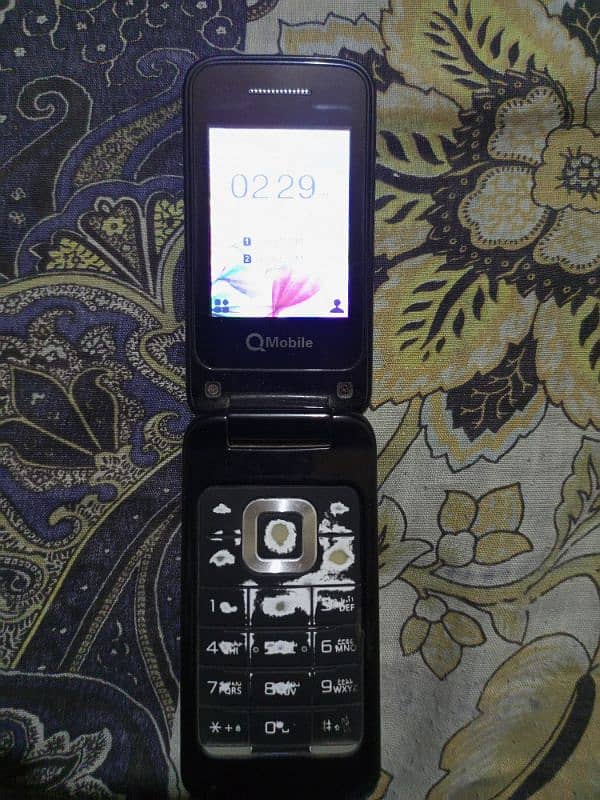 Q-Mobile 0