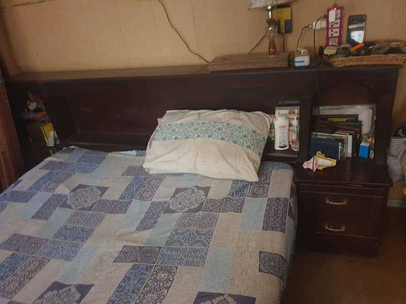 solid wood bed with side table and storage box inside 0