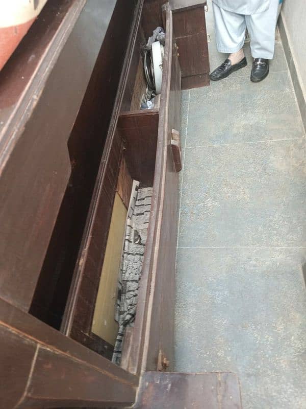 solid wood bed with side table and storage box inside 1