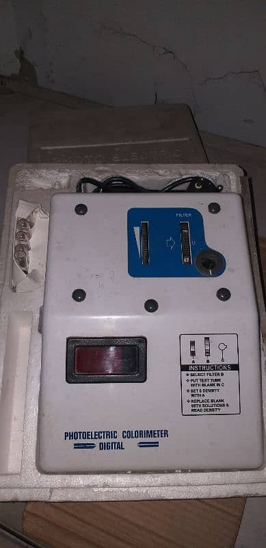 microscope centrifugal machine and electric light meter 1