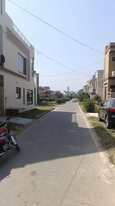 5 Marla 2.5 story gray structure house for sale 2