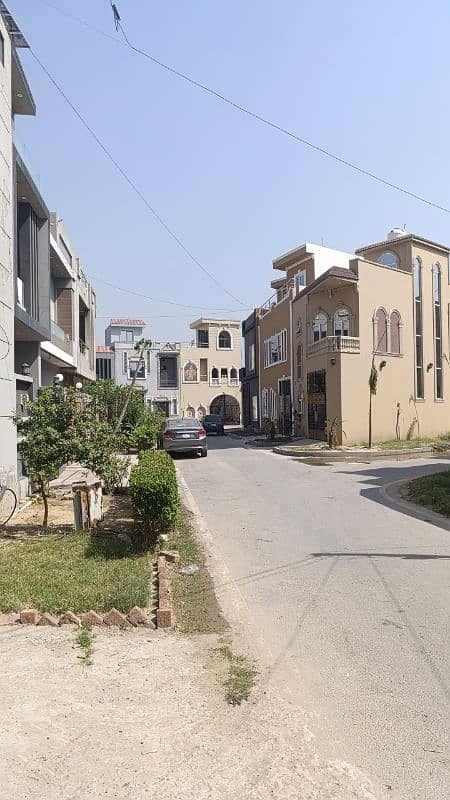 5 Marla 2.5 story gray structure house for sale 3