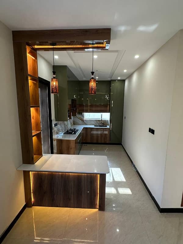 10 marla Double Unit Brand New House. Available For Sale in Top City Block d Islamabad. 14