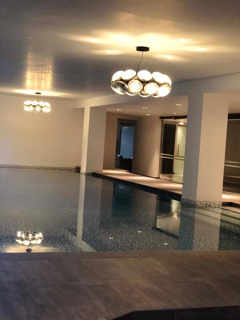 Luxury And Beautiful Prime Location Full Furnished Apartment For Rent In Main Gulberg Lahore Drowning Dining Room Kitchen Tv Lounge Servant Quarter Car Parking With Swimming Pool And Gym 24 Hours Security And Electricity Back Up 31