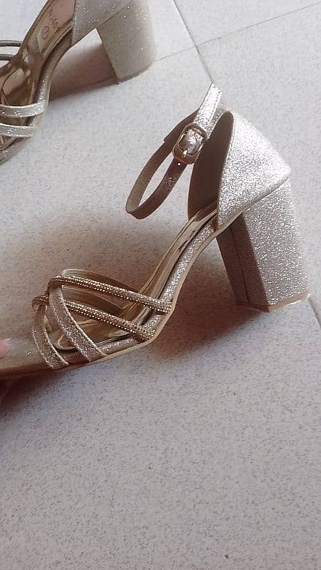 Golden sandals / footwear/ Heel For sale 0