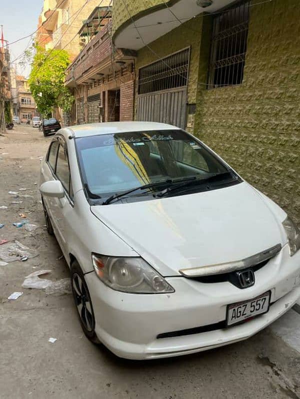 Honda City 2004 fully automatic version petrol average of 19 to 20km 0