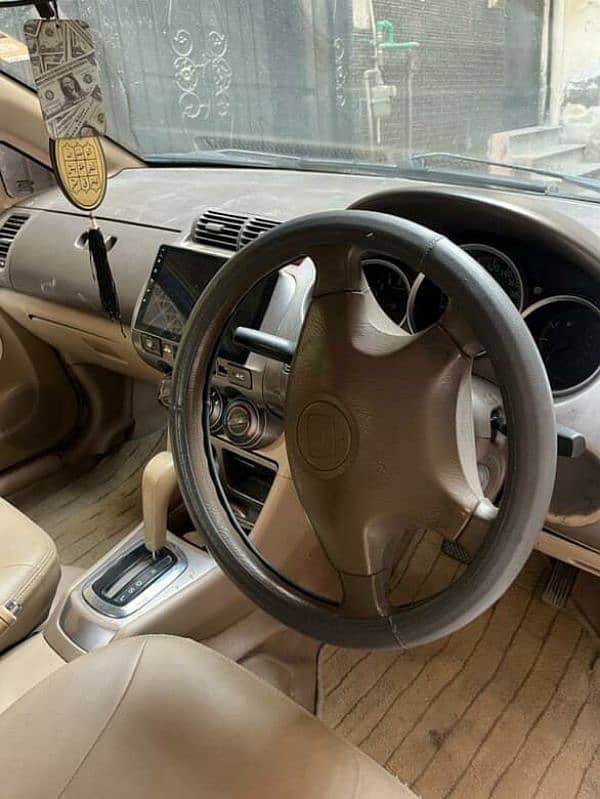 Honda City 2004 fully automatic version petrol average of 19 to 20km 2