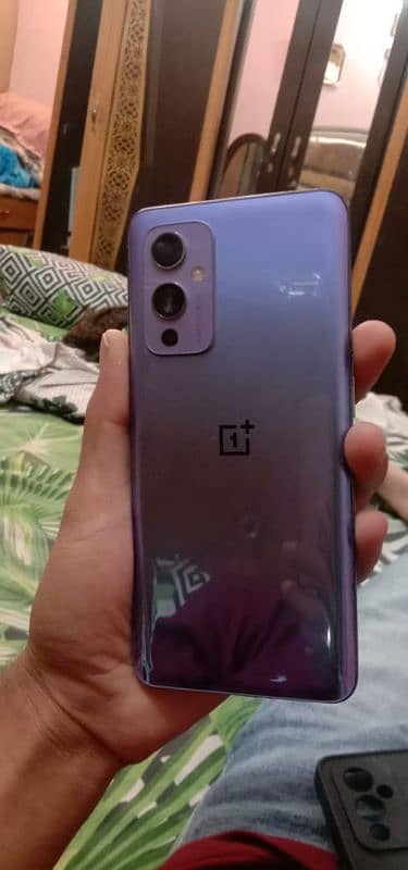 OnePlus 9 aprof 7