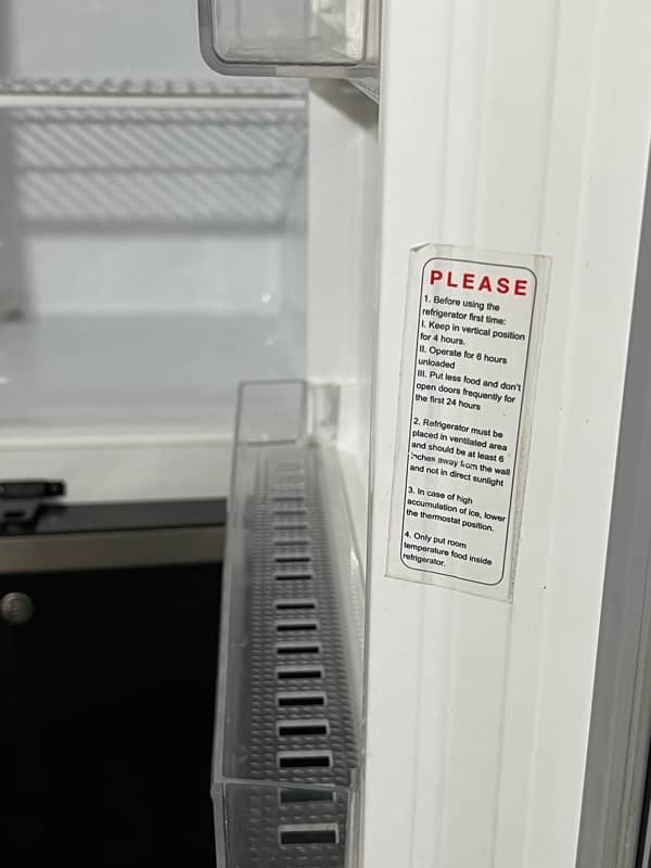 BLACK COLOUR FRIDGE DAWALANCE COMPANY 2