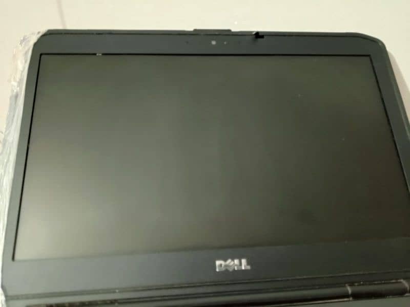 One Week Used Dell i7 LapTop With Charger. 2