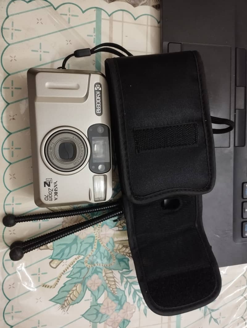 The Yashica EZS Zoom 70 is a fully automatic 35mm point-and-shoot film 3