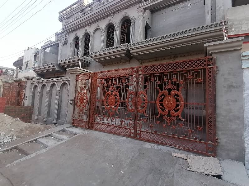 Well-constructed Grey Structure House Available For sale In Marghzar Officers Colony 2