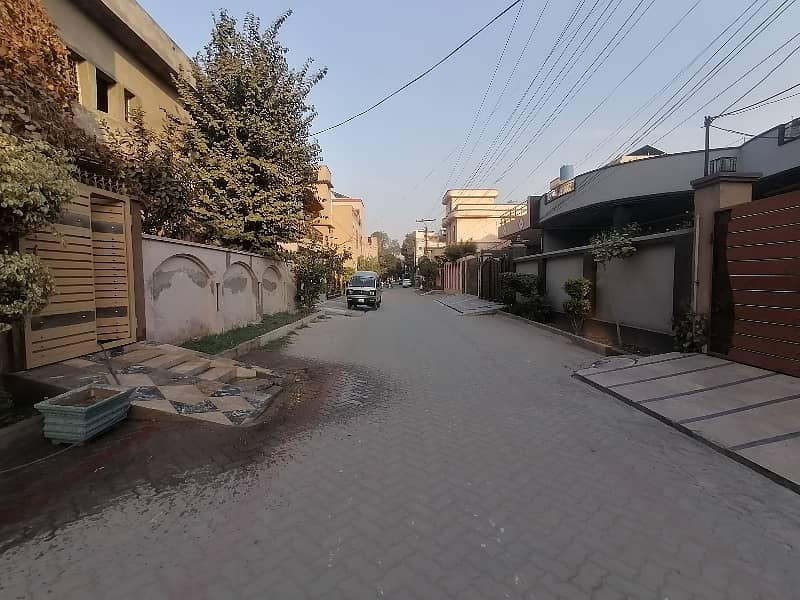 Well-constructed Grey Structure House Available For sale In Marghzar Officers Colony 8
