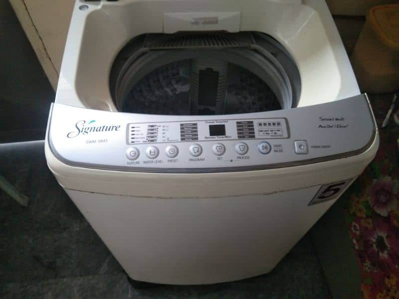 signature automatic washing machine. 3