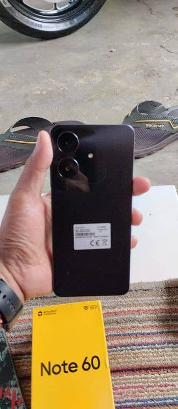 10 by 10 condition with box charger and back cover 0