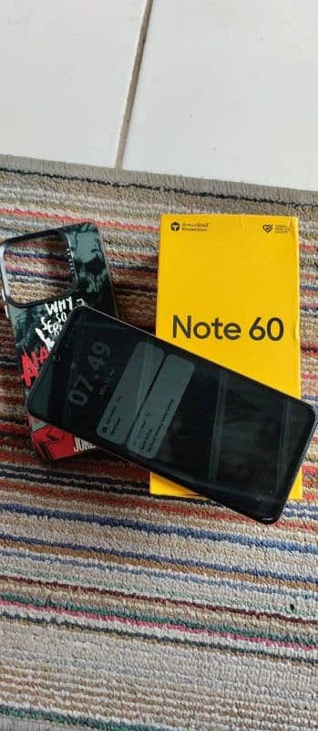 10 by 10 condition with box charger and back cover 1