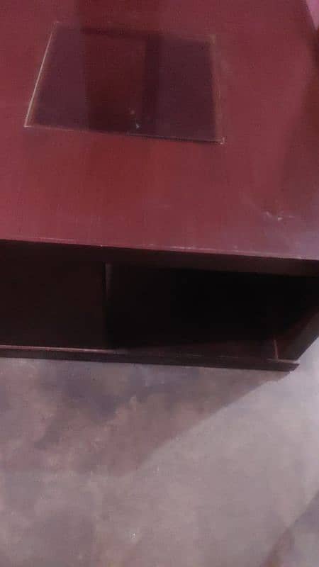 wooden big centre table with glass on center 0
