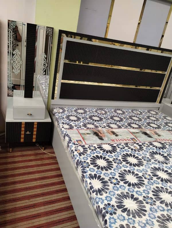 bed with side tables,dressing table, 3 door cupboards, 3 door divider 0