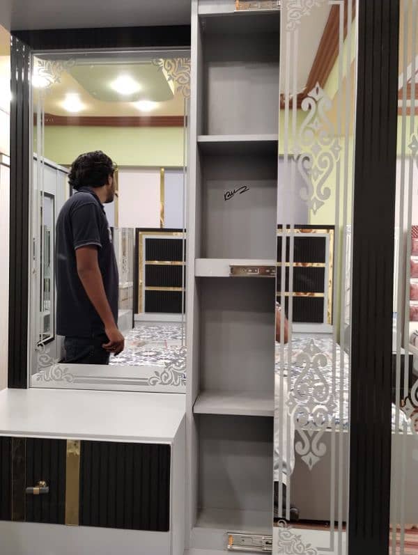bed with side tables,dressing table, 3 door cupboards, 3 door divider 4