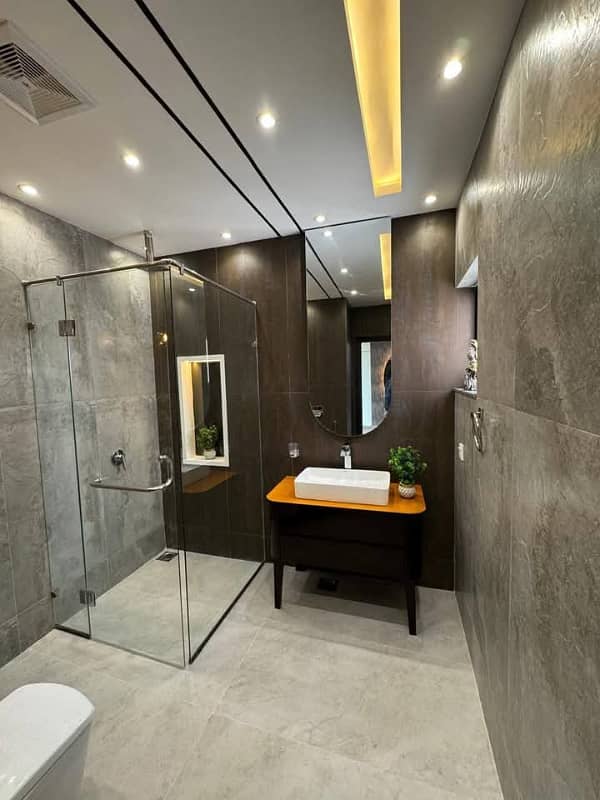 Top-Tier Address! Elegant 5-Marla Sophisticated Home with 3 Beds & Modern Features for Sale in Prime DHA Phase 9-Town A Rare Gem by Wall Green Realtors 21