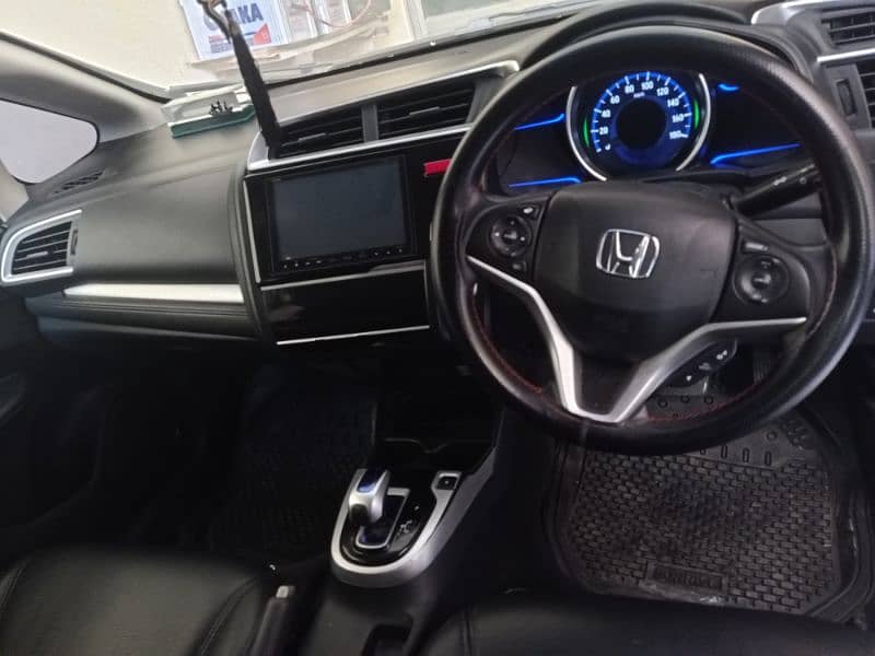 Honda Fit hybrid 14/18 Family use 24 petrol average 4