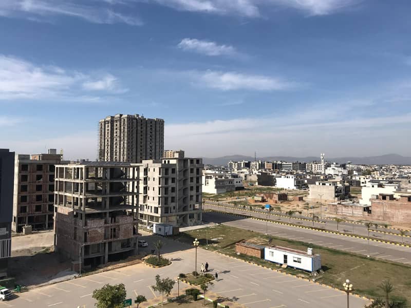 3 side corner Commercial Plot Prime Location of Faisal Town Islamabad. 1