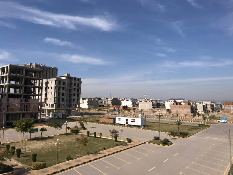 3 side corner Commercial Plot Prime Location of Faisal Town Islamabad. 3