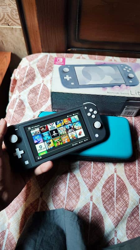 Nintendo switch lite with box 3