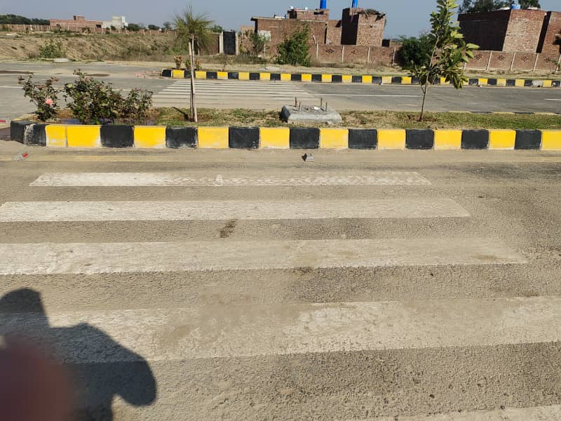 5 Marla facing park plot for sale in iqbal avenue ph 4 Broadway 9