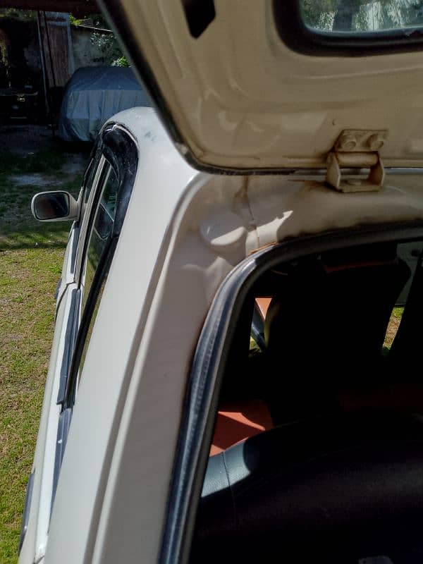 Daihatsu Cuore 2003 auto 13