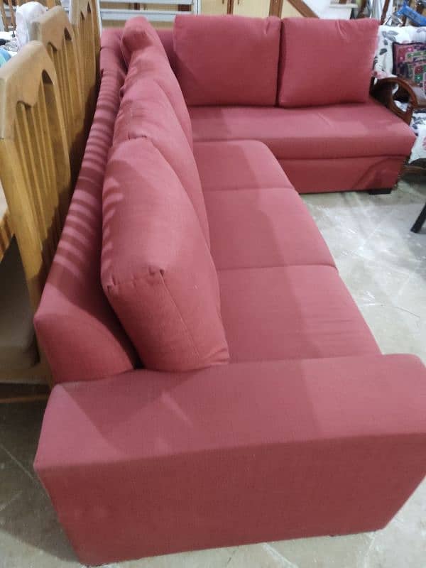 6 seater L shaped sofa red colour. 0