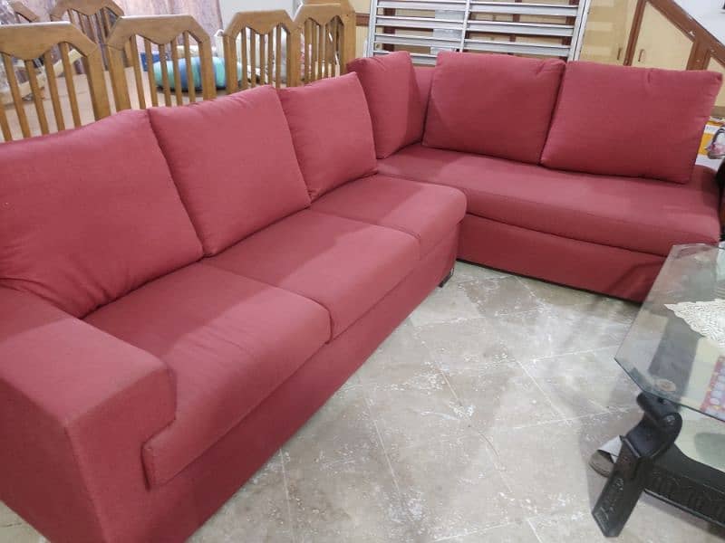 6 seater L shaped sofa red colour. 1