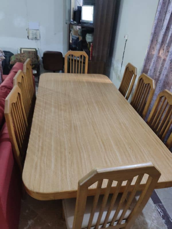 8 seater wooden Dining table with chairs. 0