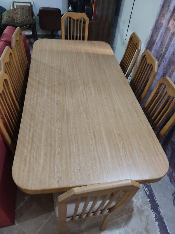8 seater wooden Dining table with chairs. 1