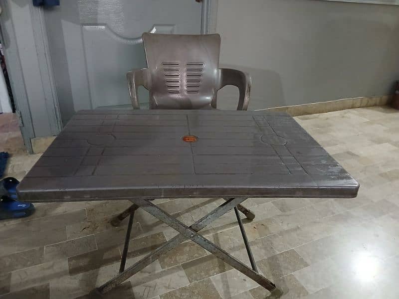 Plastic Chairs and Table 1