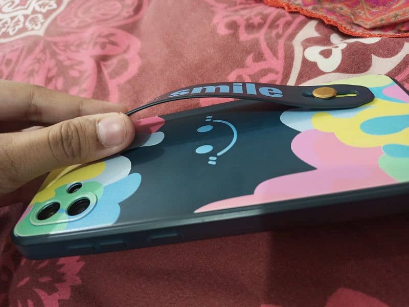 Samsung A04 mobile cover with strap and ring at the back 1