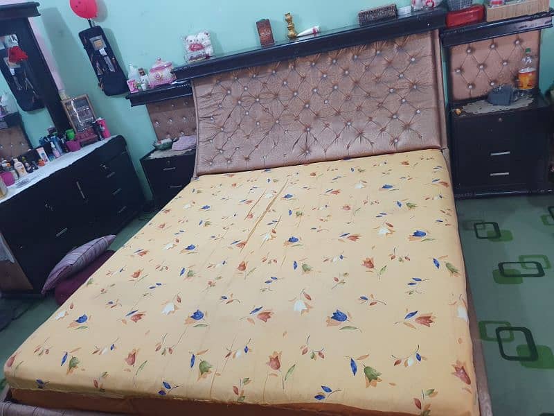 king size bed with two tables and mirror table 03449192025 2