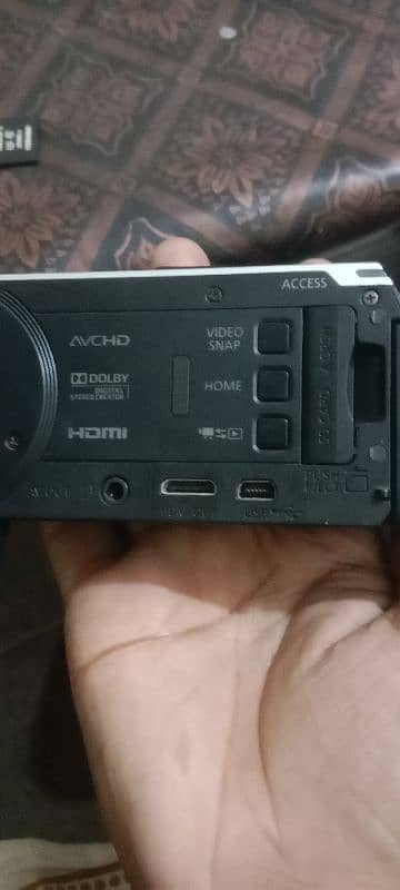canon Handycam , with tousch screen 32GB Sd card also with charger 2