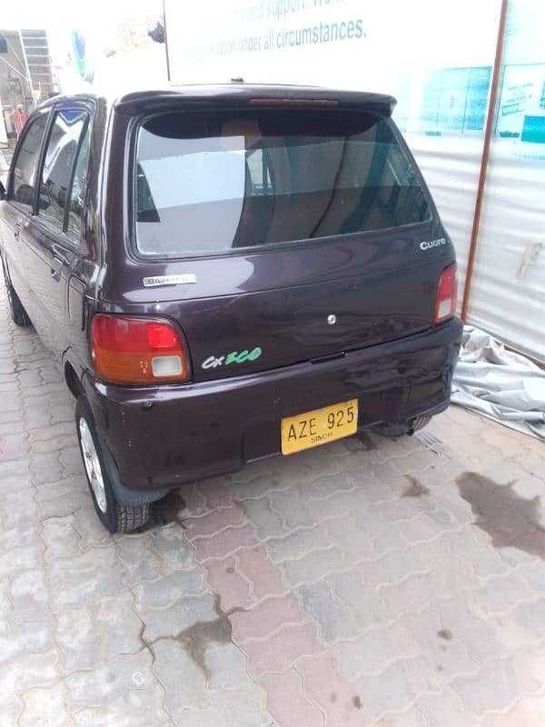 Daihatsu Cuore 2012.   no 2013 15