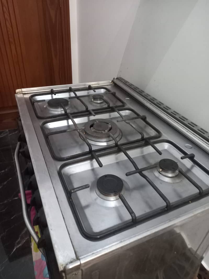 Cooking range (5 stove)  and Oven 0