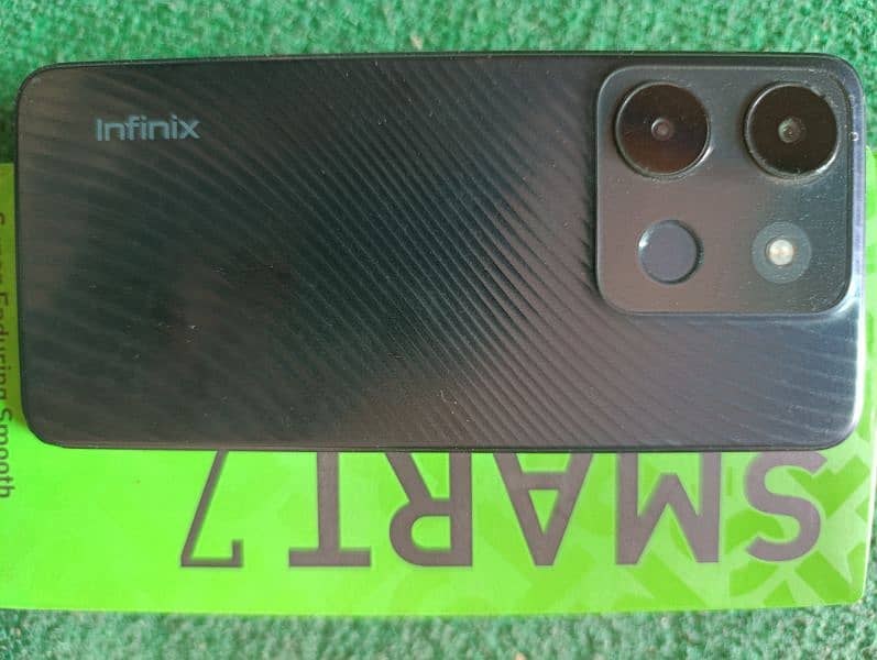 Infinix Smart 7 (Black Colour) (64GB + 7GB) 5