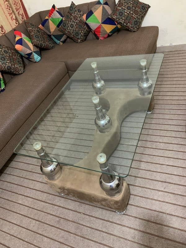 7 seater L shaped complete sofa set, 1 glass table, 4 puffy set. 6