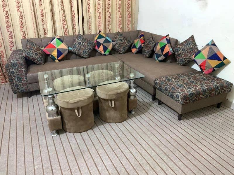 7 seater L shaped complete sofa set, 1 glass table, 4 puffy set. 0